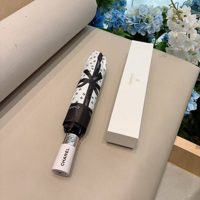 Chanel Classic Bow Three-Fold Automatic Folding Sun And Rain Umbrella. The Desig