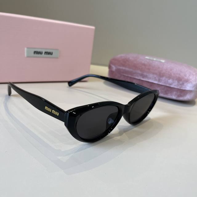 Miu Miu Sunglasses Black + Gold Logo The Perfect Combination. A Must-Have Summer