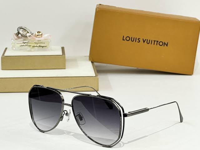 Louis Vuitto* Model: Z1315 Size: 61 Mouth 14-145