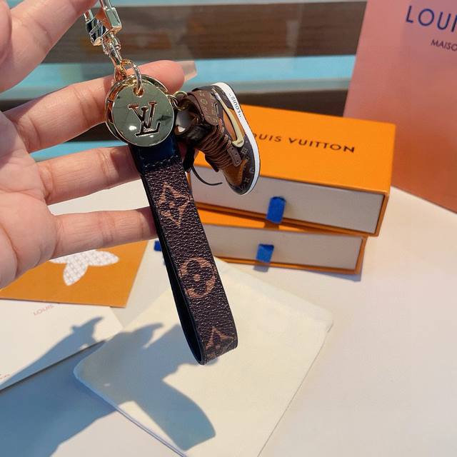 Lv Classic Monogram Checkerboard Keychain. The Keychain Features A Nike Mini Sho