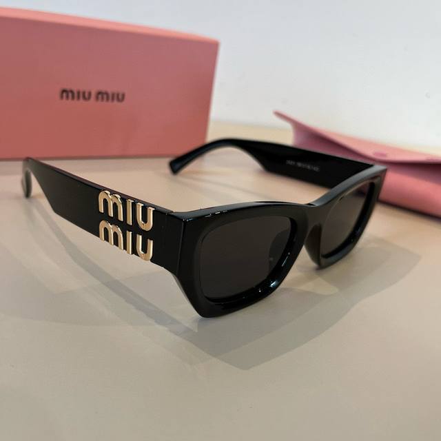 Miu Miu Sunglasses Black + Gold Logo The Perfect Combination. A Must-Have Summer