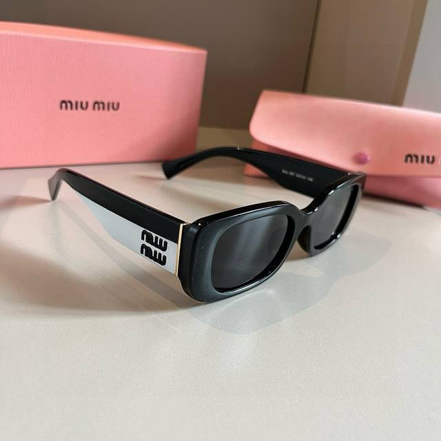 Miu Miu Sunglasses Black + Gold Logo The Perfect Combination. A Must-Have Summer