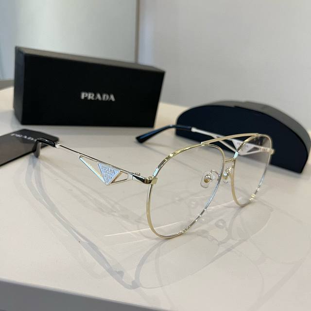 Prada Masterfully Crafted. Sunglasses, High-End, Trendy, Fashionable, Versatile