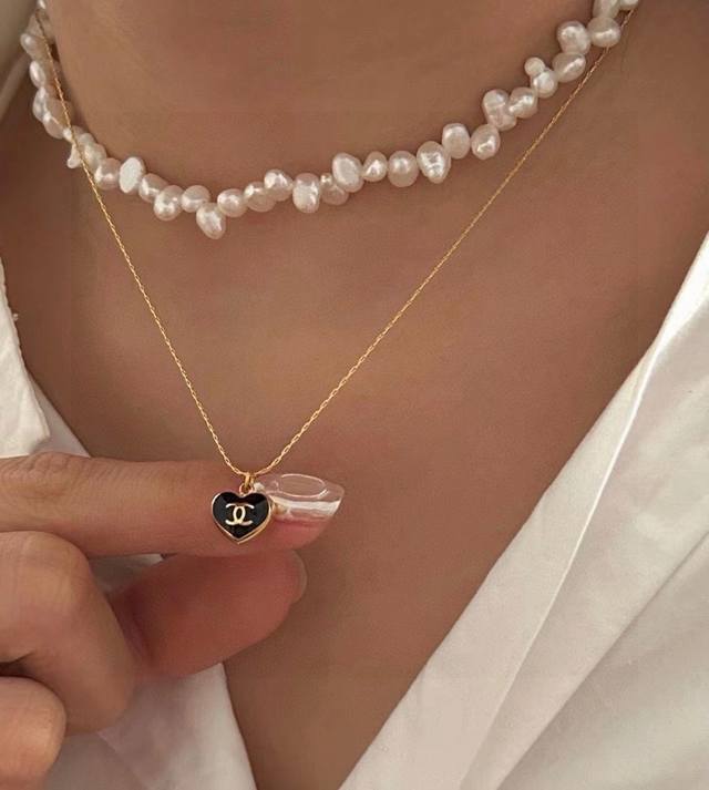 Chanel's Latest Heart-Shaped Mini Necklace With A 14K Stainless Steel Heart Pend