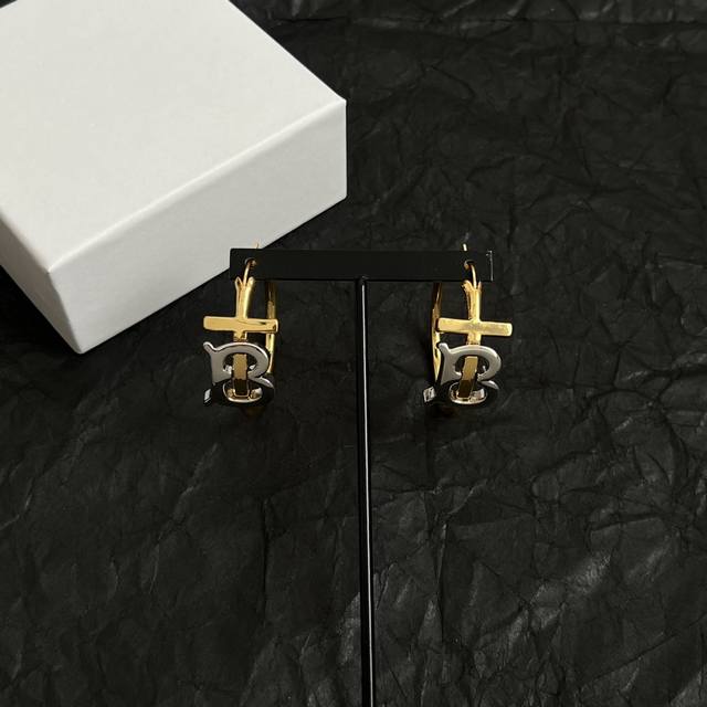 Burberry Ear Studs, Featuring The Brand's Iconic Logo Inspired By Founder Thomas