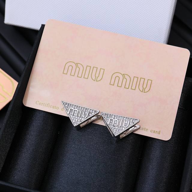 Miu Miu Retro French-Style Triangle Enamel Double-Sided Letter Stud Earrings. A