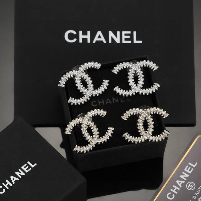 Gold And Silver Chanel Classic Double C Stud Earrings This Versatile Piece Is In