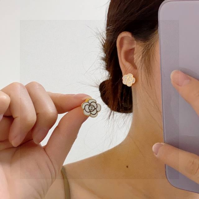 Chanel Black And White Camellia Double C Earrings This Versatile Piece Is Incred