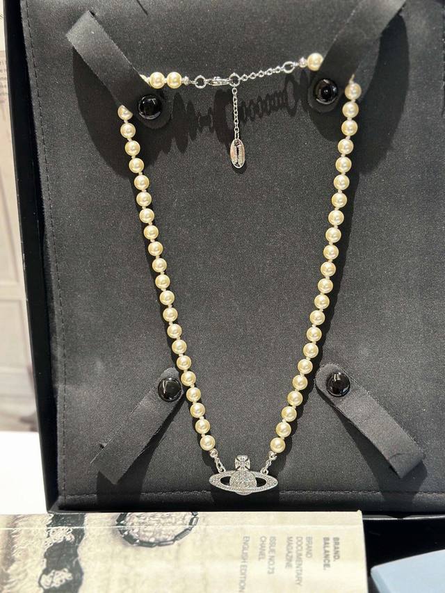 Id Xthxl0001 Vivienne Westwood Saturn Flat Pearl Necklace. I Absolutely Love See