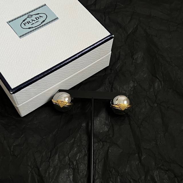Prada Triangle Earrings - Best-Selling New Arrival. Exquisitely Crafted And Time