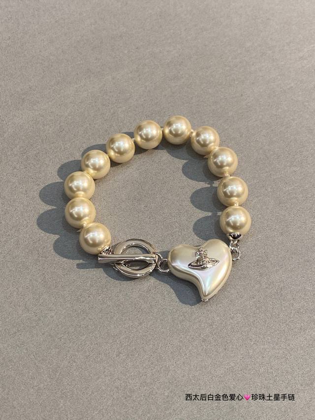 Vivienne Westwood Saturn Necklace And Bracelet. British Fashion Designer And The