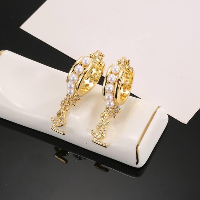 Ysl Saint Laurent Earrings, Original Brass Material. Yves Saint Laurent Was Foun