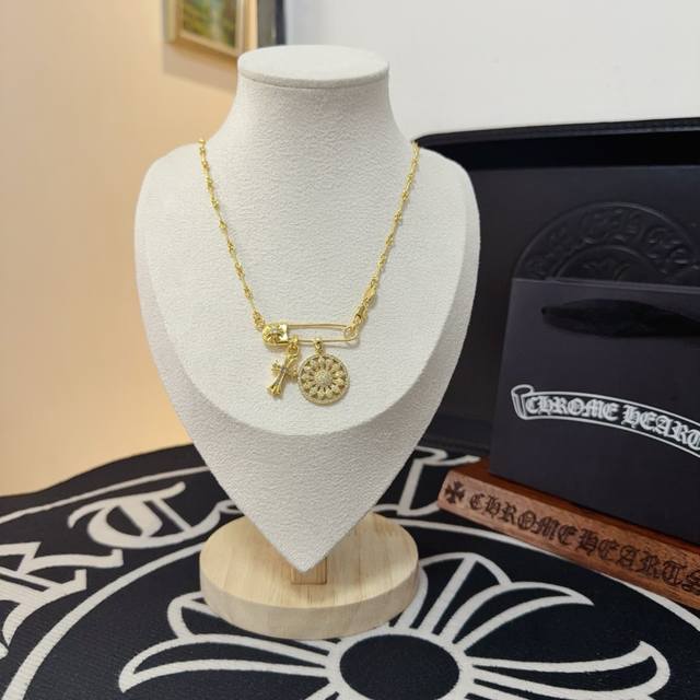 New Arrival, Store-Quality Chrome Hearts 22K Gold Sunflower Cross Necklace. The