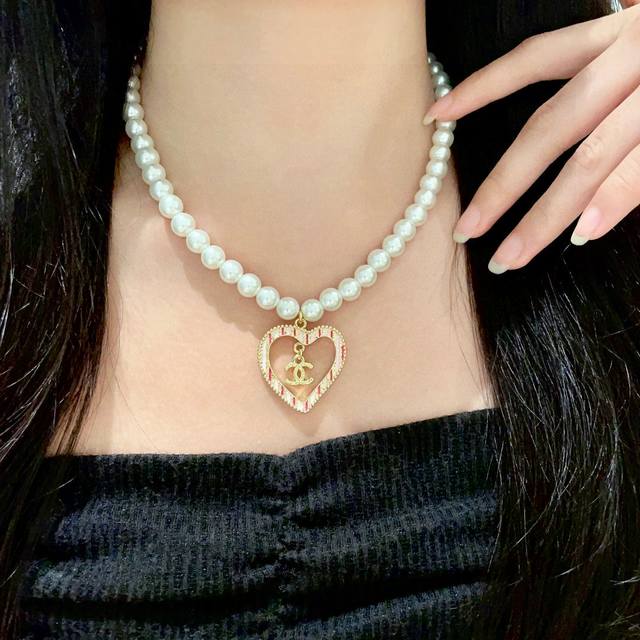 Chanel Pearl Heart Double C Necklace