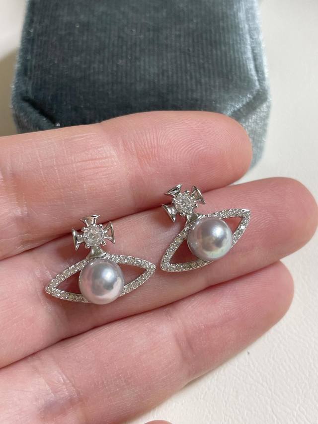 Vivienne Westwood Pearl Stud Earrings Vivienne Westwood, British Fashion Designe
