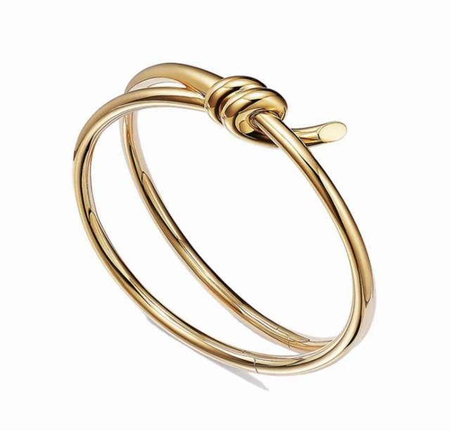 New Tiffany Knot Bracelet In Gold-Tone Material With Original Logo. Stunningly B