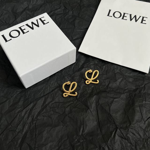 l0Ewe Loewe Earrings And A Ring Buckle With A Loewe Carved Diamond Buckle. Ex