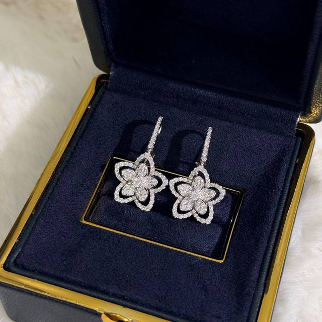 The Latest Model Of Big Flower Earrings From The Famous Brand Graff. The Proport
