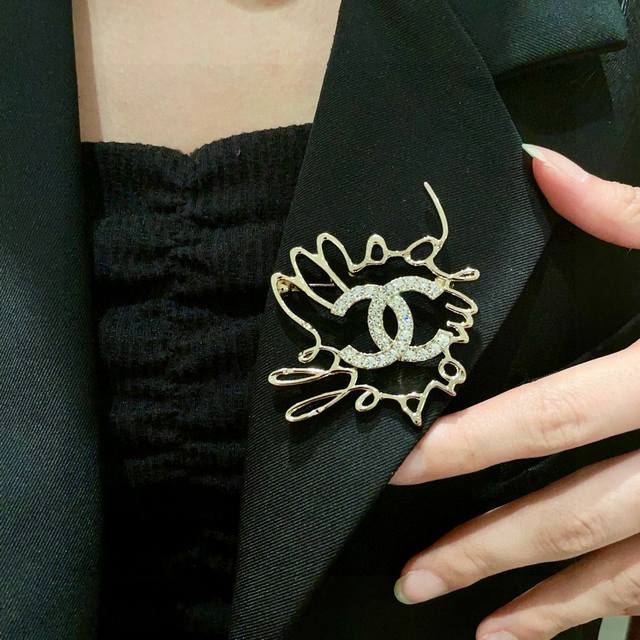 Chanel Double C Diamond Brooch.