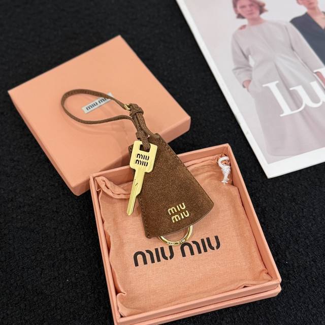 New Miumiu Miu Miu Cone-Shaped Key Bag Pendant This Leather Pendant Features A C
