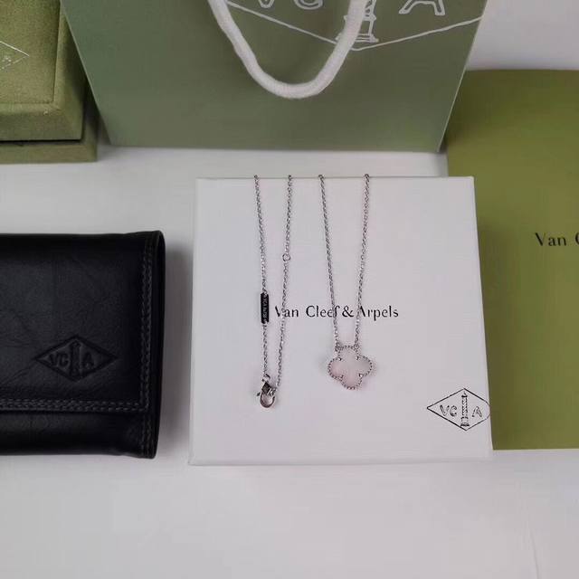 Is So Beautiful. Van Cleef & Arpels Four-Leaf Clover Platinum Natural White Moth