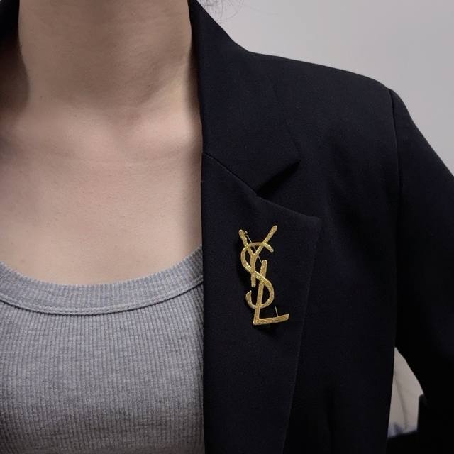 ysl The New Yves Saint Laurent Brooch Is A Retro Wood-Textured Brooch That Un