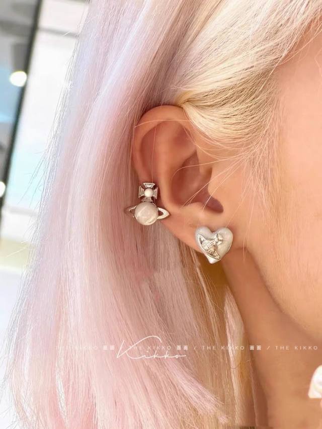 Queen Mother West's Silver Heart Saturn Ab Earrings A Playful One Vivian Queen M