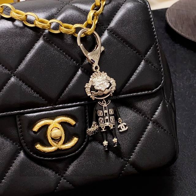 Chanel Rhinestone Lion Colorful Bag Keychain. This Accessory Is Made Of Luxuriou