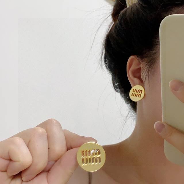 The New Miu Miu Miumiu Round Hollow Letter Design Earrings Are A Must-Have Item