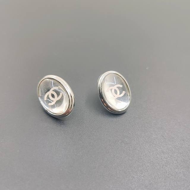 chanel Latest Platinum Transparent Oval Earrings Consistent With Z Batch Bras