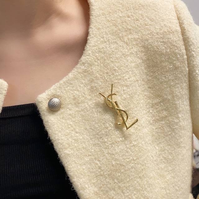 ysl The New Yves Saint Laurent Brooch Is A Retro Wood-Textured Brooch That Un