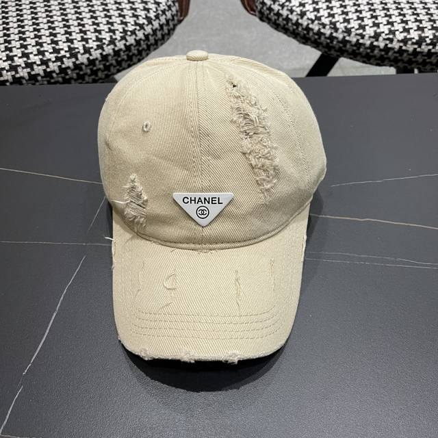 Chanel's New Distressed Baseball Cap With Holes Is The Hottest Color At The Mome