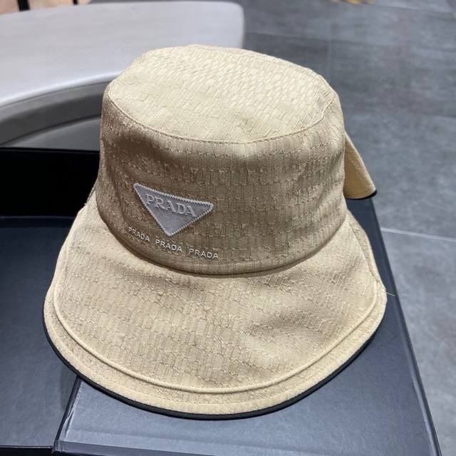 Prada's New Early Spring Fisherman Hat Is Simple And Sweet. The Hood Shape Is Ve