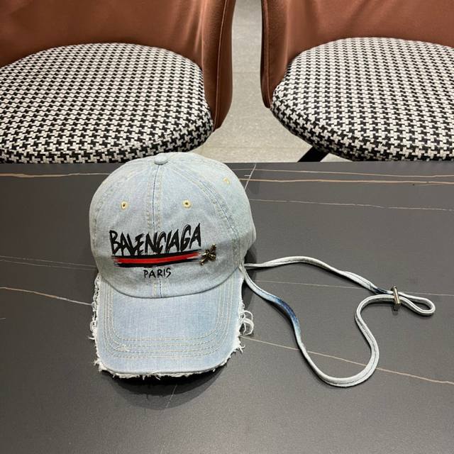 Balenciaga's New Denim Baseball Cap Is A Must-Have For Hiking. Very Useful