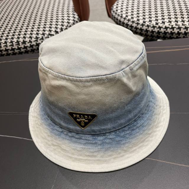 Prada's New Spring And Summer Fisherman Hat Is Simple And Sweet. The Hood Shape