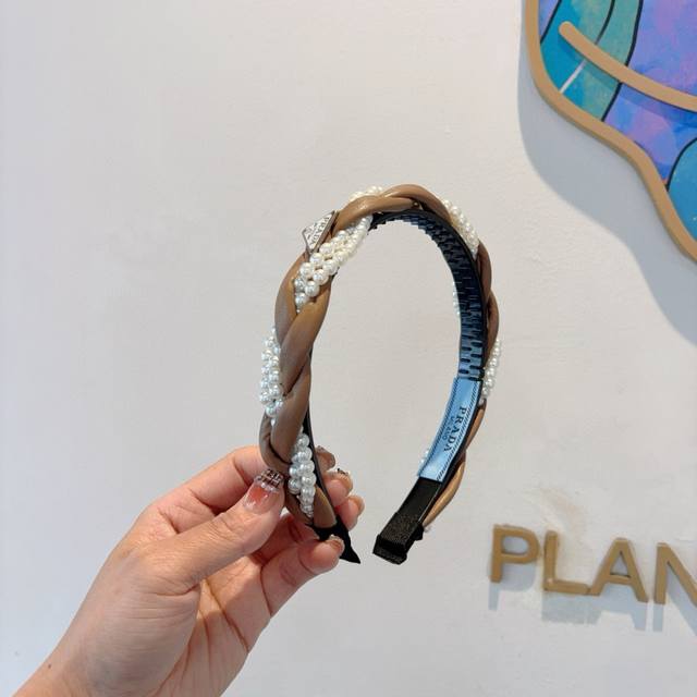 With Packaging Prada Prada's New Trendy Pearl Headband Is A Must-Have Item For G