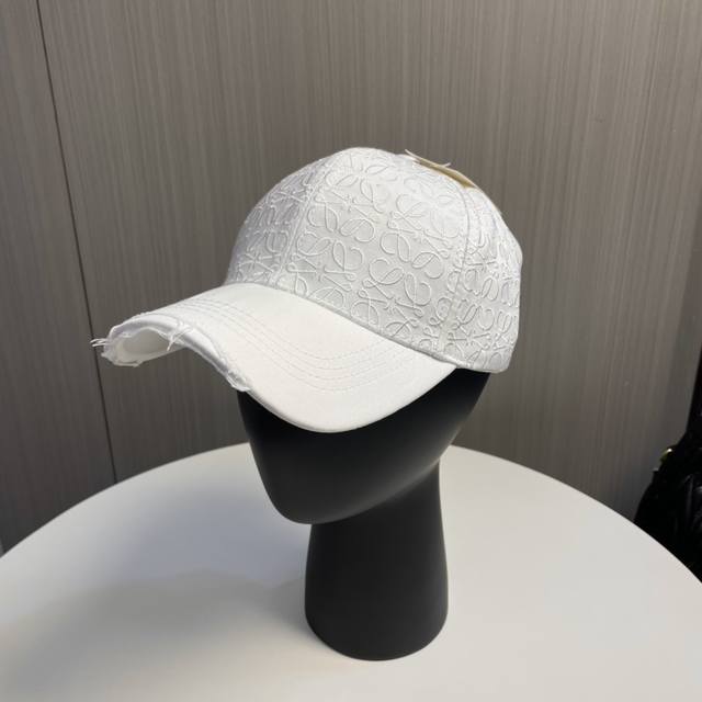 With Dust Bag Loewe's New Embroidered Baseball Cap Is Shipped Simultaneously Wit