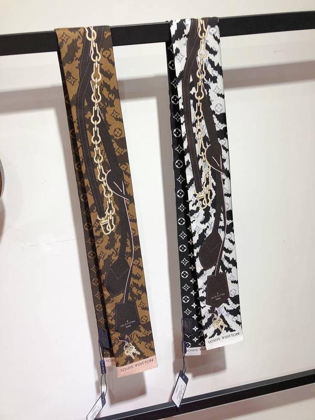 plv2350Lv Tigergram Headband With Tiger Pattern And Classic Chain Tag. Reinte