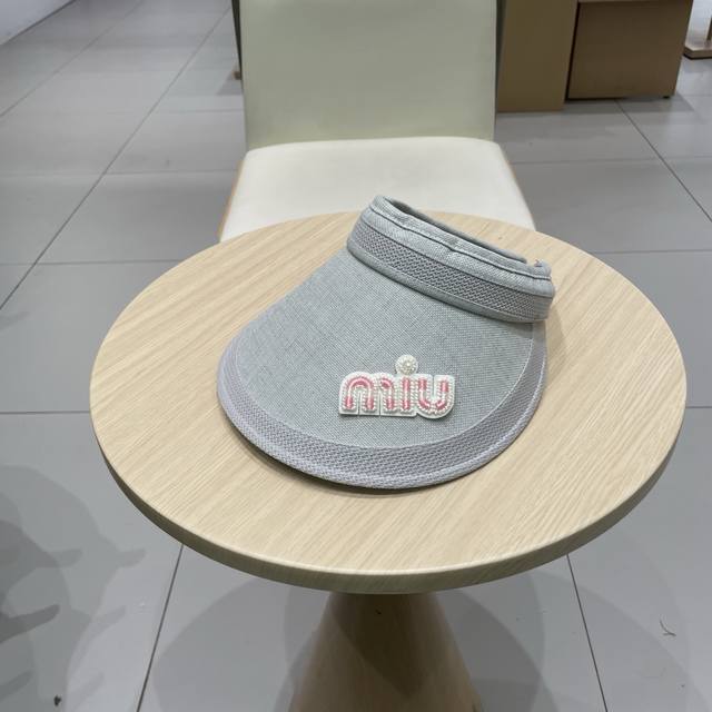 The Miu Miu Hollow Hat Is A Must-Have Item In Summer Because It Is So Easy To Ma
