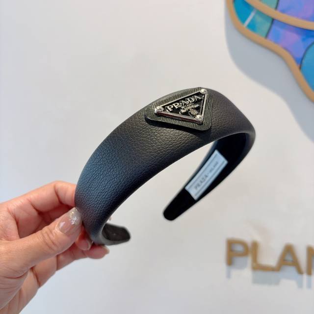 With Packaging Prada Prada's New Inverted Triangle Trend Headband Is A Must-Have