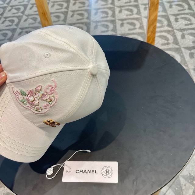 Chanel's New Baseball Cap Has Very Cool Colors And Can Be Worn By Women In Diffe