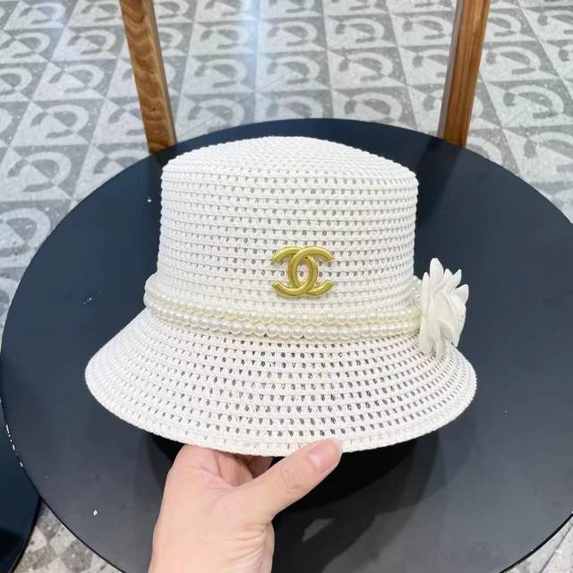 chanel Chanel's New Camellia Pearl Chain Braided Flat-Top Straw Hat Bucket Ha