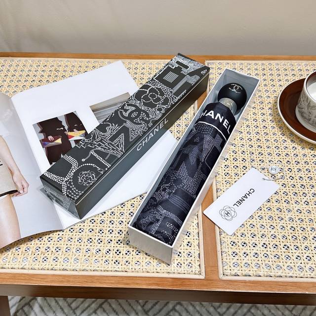 chanel Chanel's New Three-Fold Automatic Folding Umbrella Is Exquisitely Craf