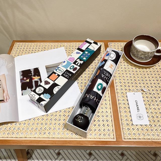 chanel Chanel's New Three-Fold Automatic Folding Umbrella Is Exquisitely Craf