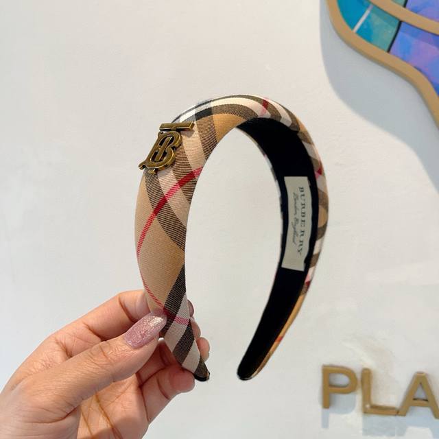 With Packaging Burberry's New Headband Is Available For Purchase. All Fabric Det