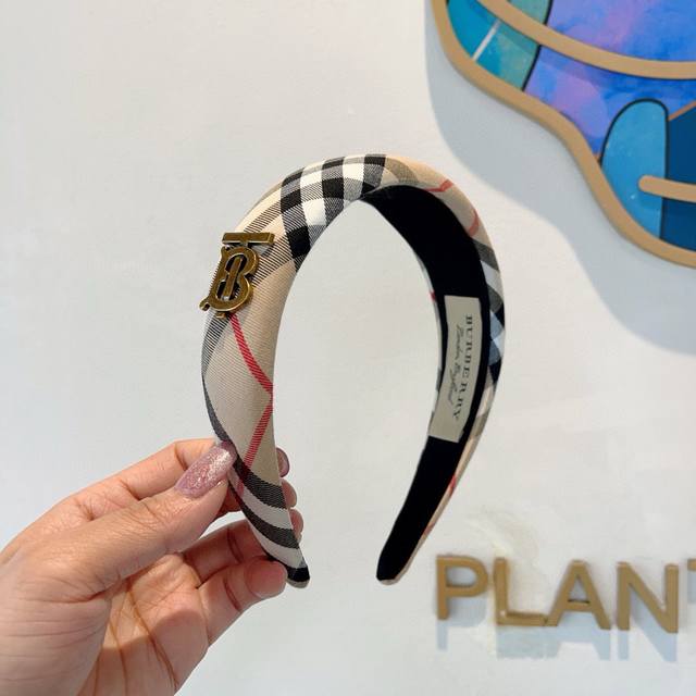 With Packaging Burberry's New Headband Is Available For Purchase. All Fabric Det