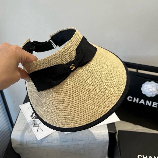 Chanel Chanel bow sun hat, hollow straw hat, adjustable