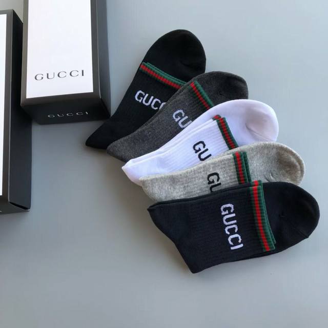 Gucci men's socks, five pairs in a box, red and green stripes with the brand's f
