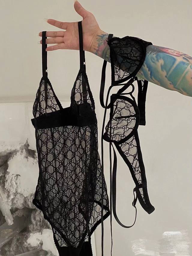 Gucci G letter embroidered mesh sexy jumpsuit Translucent black tells the pure s