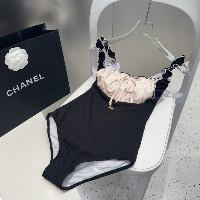Miumiu swimsuit, a must-have for fashionistas. Super figure-flattering! Sml